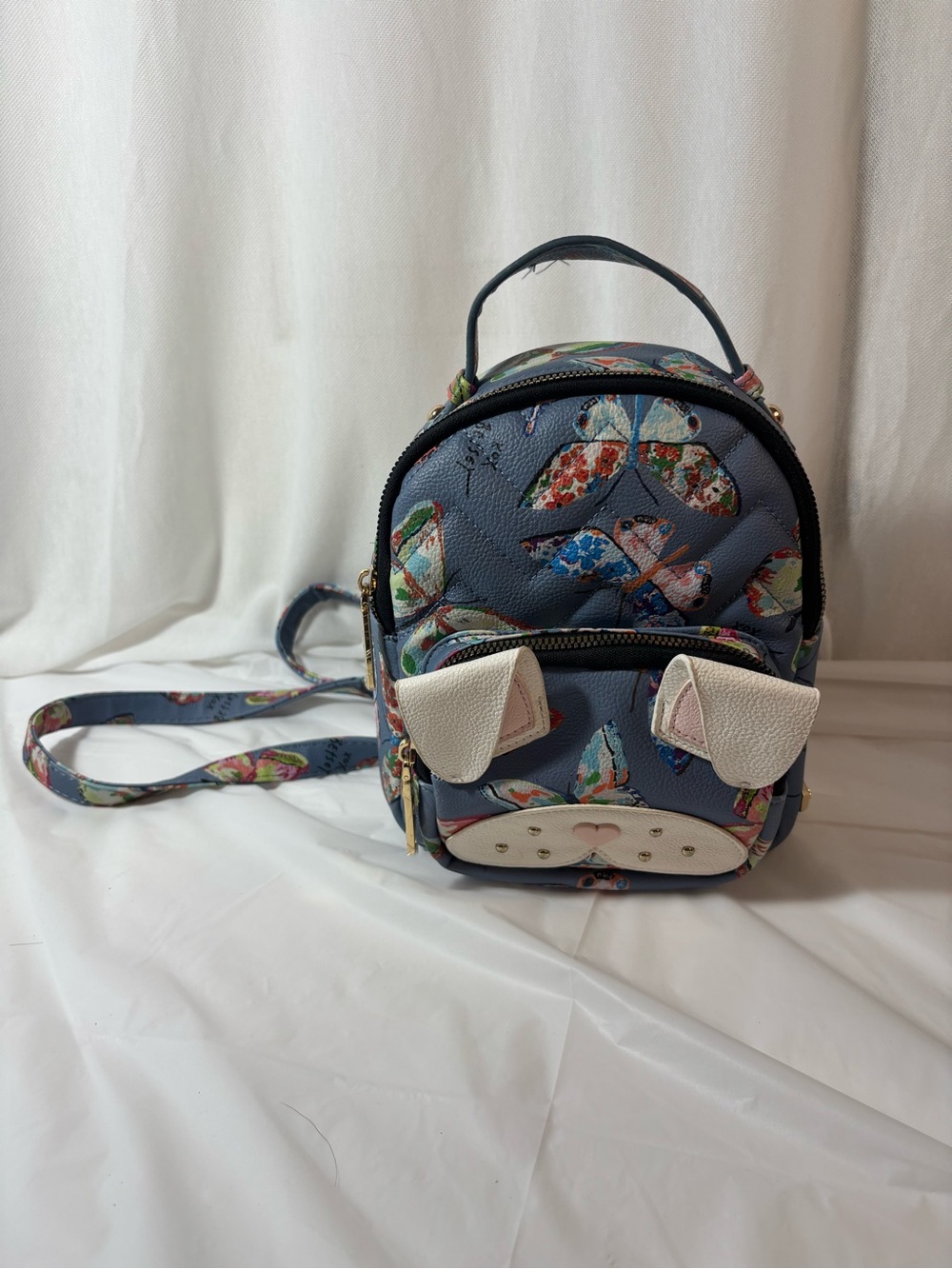 Betsey Johnson mini backpack with cat/bunny and butterfly design. Leather